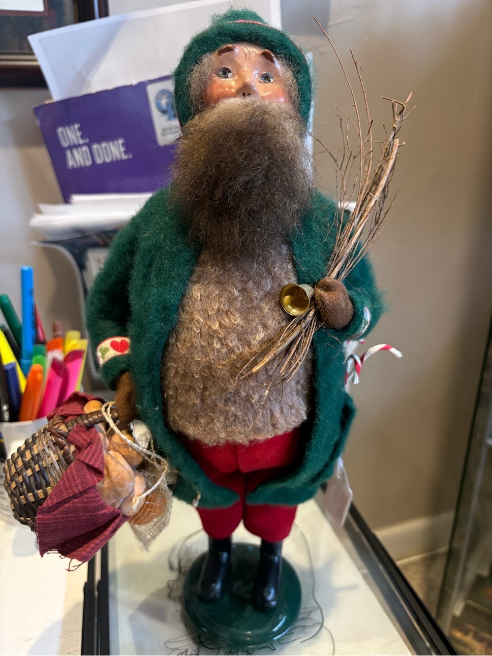 Folk-Style Bearded Santa Figurine in Green Coat and Red Trousers